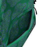 A view of the inside pocket of a Xigfireon graphic backpack featuring the Living Colour Forest Inverted iteration of the `Reach Of The Spirit` Celtic knot pattern.