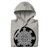 A folded carbon grey Xigfireon graphic hoodie featuring the Black & White Circle iteration of the Morning Star Fire Celtic knot design. This Celtic knot symbolizes the Sun.