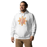 A young man wearing a white Xigfireon graphic hoodie featuring the Fire Colour Flat iteration of the Morning Star Fire Celtic knot design. The Morning Star Fire Celtic knot represents our brilliant Father Sun.