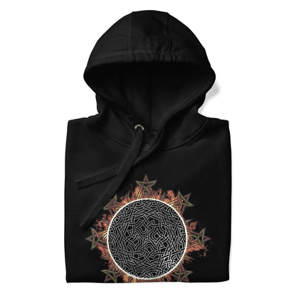 A folded black Xigfireon graphic hoodie featuring the Eclipsed iteration of the Morning Star Fire Celtic knot design, inspired by the 2023 Annular Solar Eclipse.
