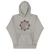 A carbon grey Xigfireon graphic hoodie featuring the Eclipsed iteration of the Morning Star Fire Celtic knot design, inspired by the 2023 Annular Solar Eclipse.