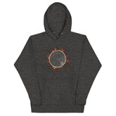 A charcoal heather grey Xigfireon graphic hoodie featuring the Eclipsed iteration of the Morning Star Fire Celtic knot design, inspired by the 2023 Annular Solar Eclipse.