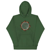 A forest green Xigfireon graphic hoodie featuring the Eclipsed iteration of the Morning Star Fire Celtic knot design, inspired by the 2023 Annular Solar Eclipse.