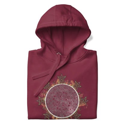 A folded maroon Xigfireon graphic hoodie featuring the Eclipsed iteration of the Morning Star Fire Celtic knot design, inspired by the 2023 Annular Solar Eclipse.