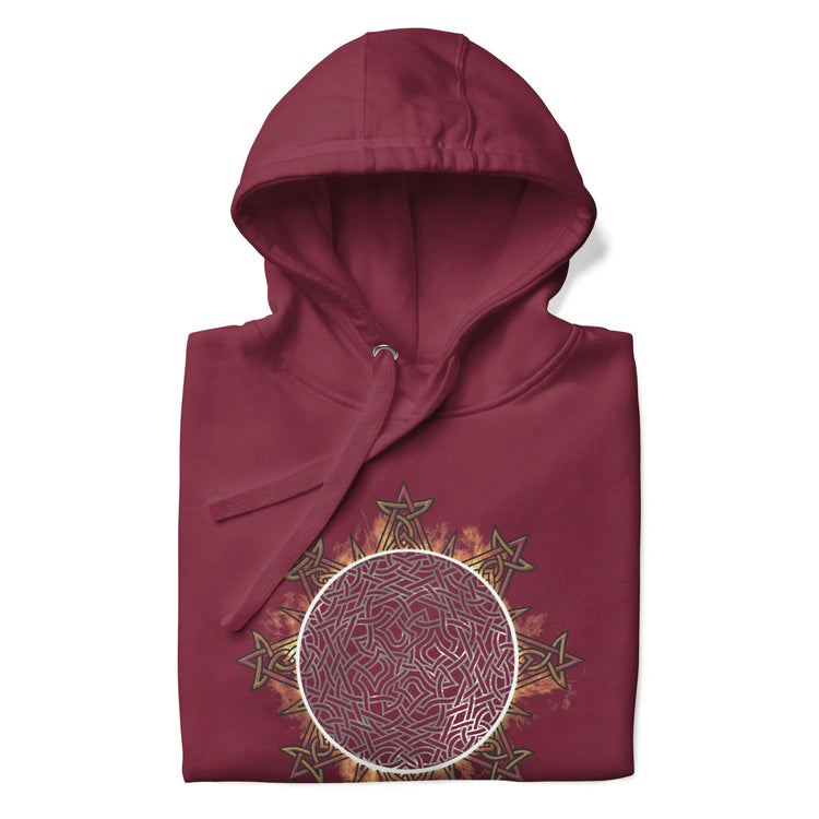 A folded maroon Xigfireon graphic hoodie featuring the Eclipsed iteration of the Morning Star Fire Celtic knot design, inspired by the 2023 Annular Solar Eclipse.