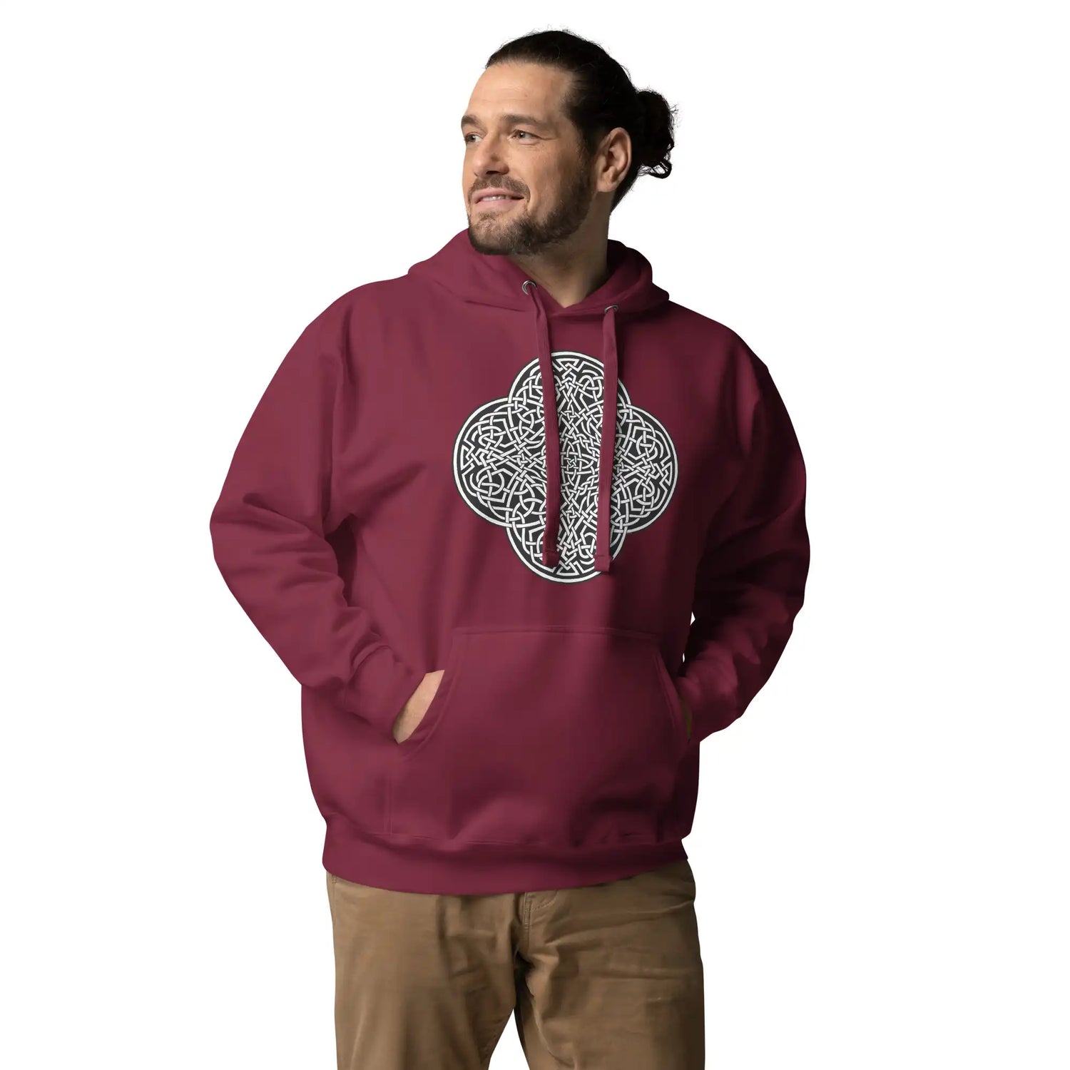A young man wearing a maroon Xigfireon graphic hoodie featuring the Black & White Solid iteration of the Reach Of The Spirit Celtic knot design. The Reach Of The Spirit Celtic knot symbolizes the Earth.