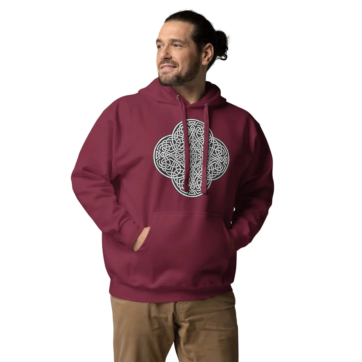 A young man wearing a maroon Xigfireon graphic hoodie featuring the Black &amp; White Solid iteration of the Reach Of The Spirit Celtic knot design. The Reach Of The Spirit Celtic knot symbolizes the Earth.