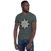 A young man wearing a dark heather Xigfireon graphic t-shirt featuring the Black & White Circle iteration of the Morning Star Fire Celtic knot design. The Morning Star Fire Celtic knot represents Father Sun and the eternal Cosmic Light.
