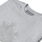 A close-up view of a sport grey Xigfireon graphic t-shirt featuring the Black & White Hollow iteration of the Morning Star Fire Celtic knot design. The Morning Star Fire Celtic knot symbolizes the Sun.