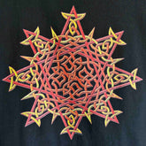 A close-up view of a black Xigfireon graphic t-shirt featuring the Fire Colour iteration of the Morning Star Fire Celtic knot design. The Morning Star Fire Celtic knot represents Father Sun and the eternal Cosmic Light.