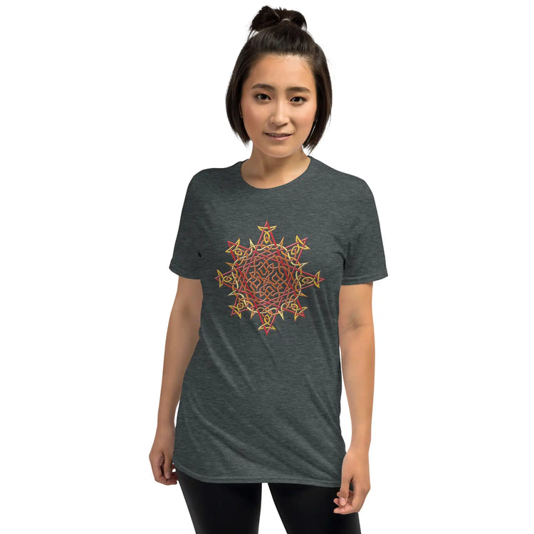 A young woman wearing a dark heather Xigfireon graphic t-shirt featuring the Fire Colour iteration of the Morning Star Fire Celtic knot design. The Morning Star Fire Celtic knot symbolizes Father Sun.
