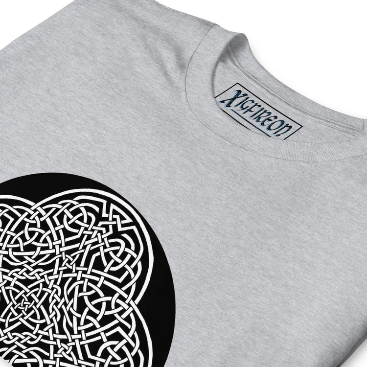 A close-up view of a sport grey Xigfireon graphic t-shirt featuring the Black & White Circle iteration of the Reach Of The Spirit Celtic knot design. The Reach Of The Spirit Celtic knot represents Mother Earth.