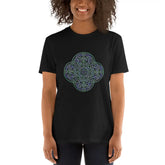 A young woman wearing a black Xigfireon graphic t-shirt featuring the Living Colour iteration of the Reach Of The Spirit Celtic knot design. The Reach Of The Spirit Celtic knot symbolizes Mother Earth.