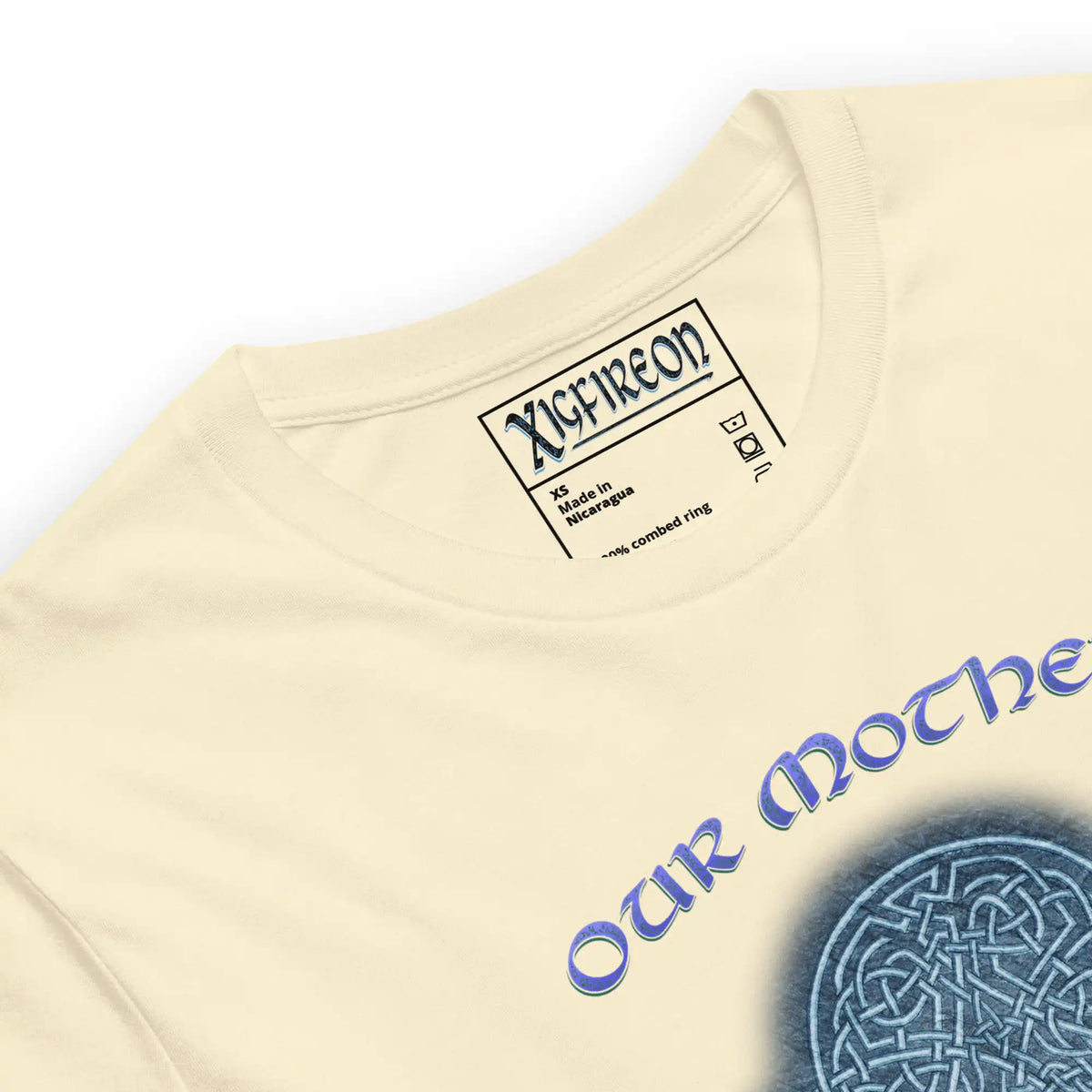 Close up of our naturally colored graphic t-shirt featuring the Blue Slate iteration of the Reach Of The Spirit Celtic knot design along with a message in a Celtic font: "Our Mother, Cherish Her".
