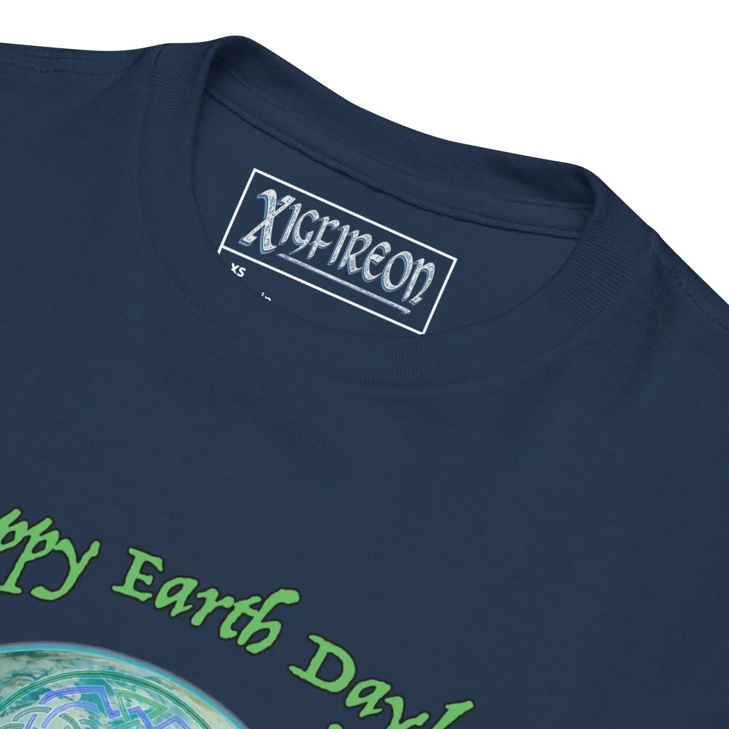 A close up view of a kids navy blue graphic t-shirt featuring the Sacred Planet iteration of the `Reach Of The Spirit` Celtic knot design under a message reading "Happy Earth Day".
