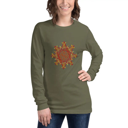 A young woman wearing a military green Xigfireon long sleeve graphic t-shirt featuring the Fire Colour iteration of the Morning Star Fire Celtic knot design. The Morning Star Fire Celtic knot is a Sun symbol.