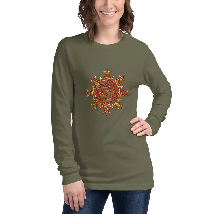 A young woman wearing a military green Xigfireon long sleeve graphic t-shirt featuring the Fire Colour iteration of the Morning Star Fire Celtic knot design. The Morning Star Fire Celtic knot is a Sun symbol.