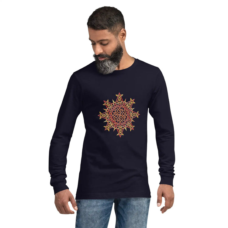 A young man wearing a navy blue Xigfireon long sleeve graphic t-shirt featuring the Fire Colour iteration of the Morning Star Fire Celtic knot design. The Morning Star Fire Celtic knot is a Sun symbol.