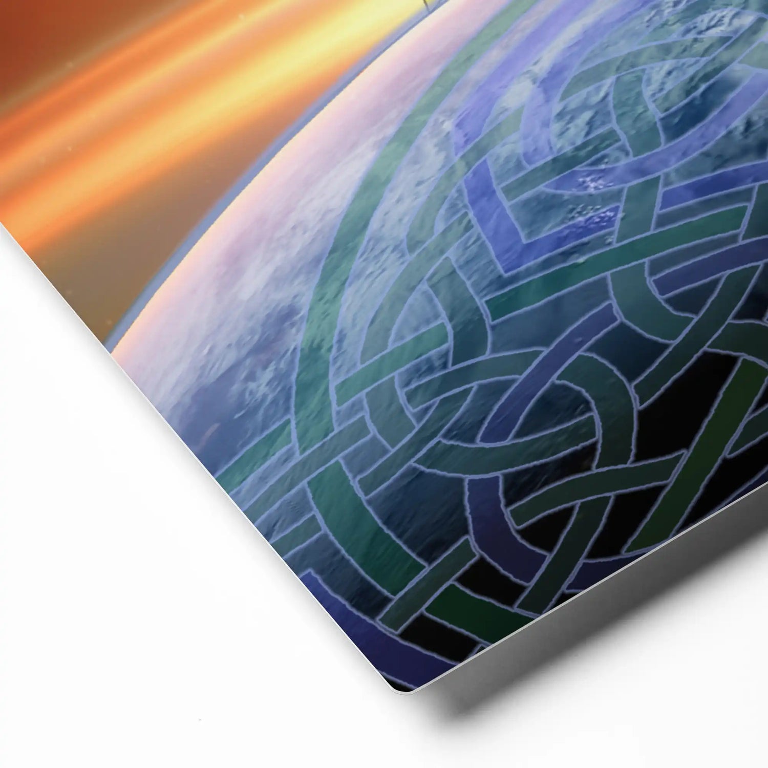 A close-up view of a 16" x 20" glossy metal print of the Derivation II Celtic knot design, which represents the Sun and the Earth in their cosmic dance.