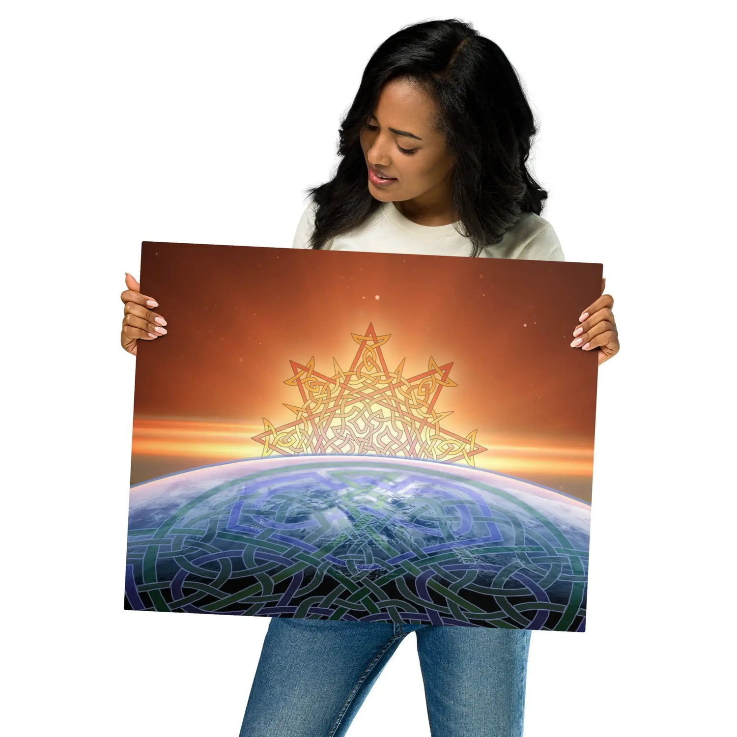 A young woman holding a Xigfireon 16 inch x 20 inch glossy metal print of the Derivation II Celtic knot design, which represents the Sun and the Earth in their cosmic dance.