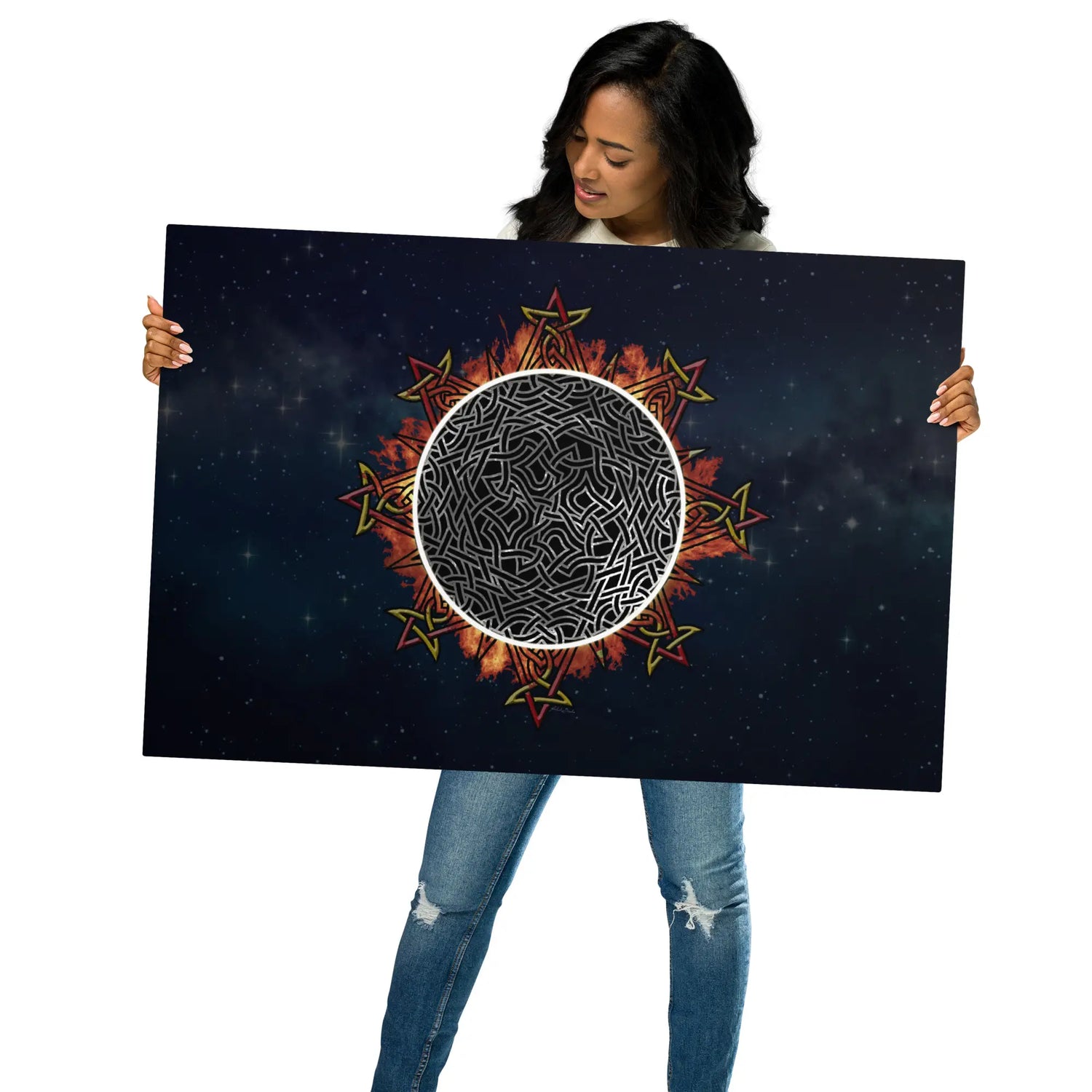 A young woman holding a 24" x 36" glossy metal print of Xigfireon&