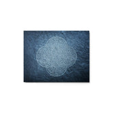 An 11" x 14" glossy metal art print of the Blue Slate iteration of the Reach Of The Spirit Celtic knot design.