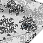 A close up view of the Xigfireon logo on a medium sized (21.25 inch x 21.25 inch) `Morning Star Fire` Black and White Solid Cosmos Inverted bandana.