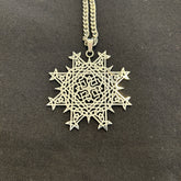 Necklace with a Morning Star Fire Celtic knot pendant in flat stainless steel by Xigfireon.