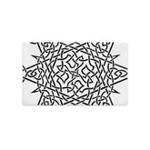 The back side of an 20 inch by 12 inch Xigfireon pillowcase featuring the inverted Black & White Súmáilte iteration of the Morning Star Fire Celtic knot design. The Morning Star Fire Celtic knot is a Sun symbol.