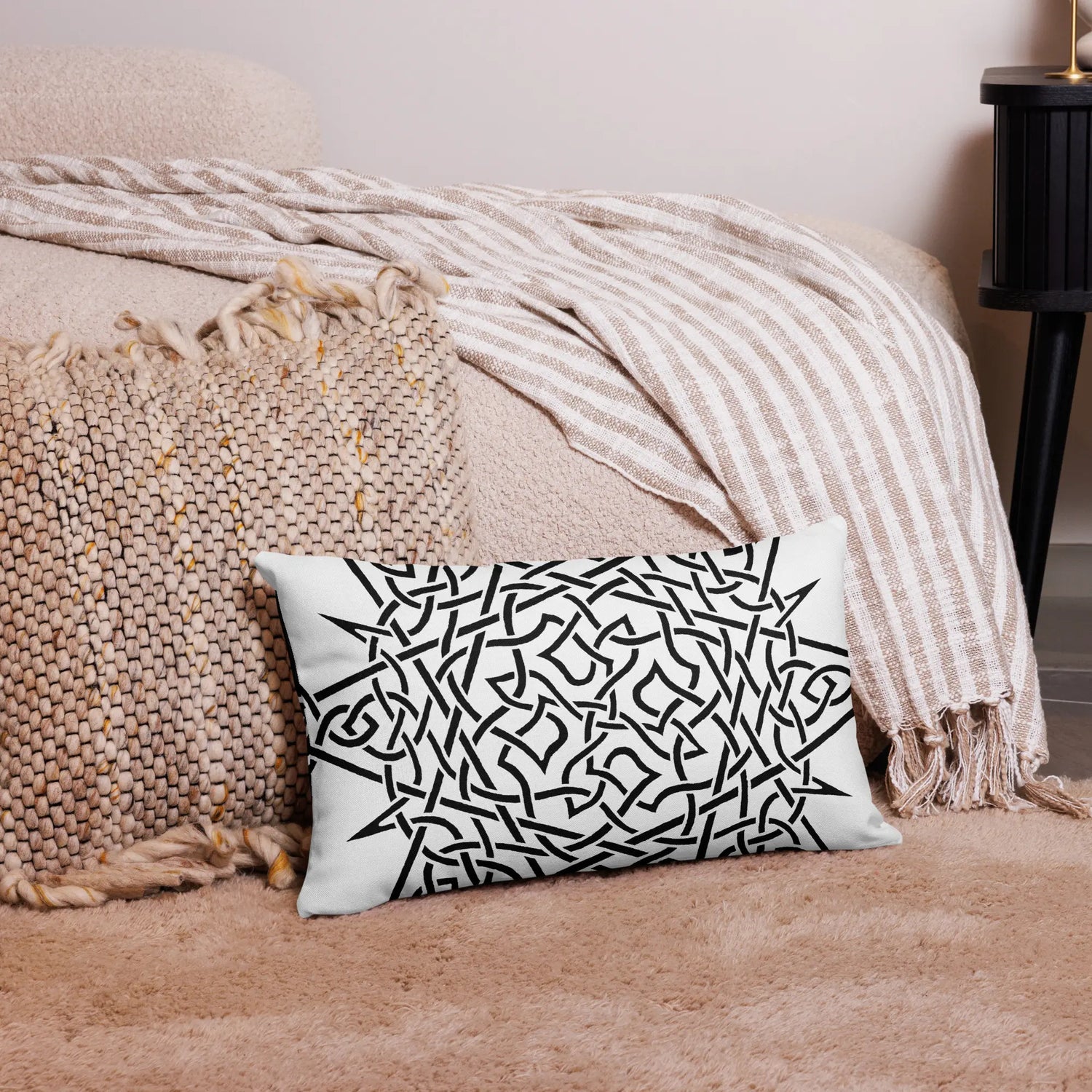 The back side of a 20 inch by 12 inch Xigfireon pillowcase featuring the inverted Black & White Súmáilte iteration of the Morning Star Fire Celtic knot design. The Morning Star Fire Celtic knot symbolizes Father Sun.