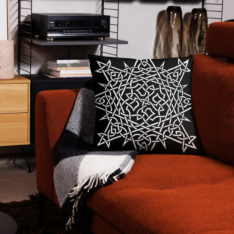 The front side of a 22 inch by 22 inch Xigfireon pillowcase featuring the Black & White Súmáilte iteration of the Morning Star Fire Celtic knot design. The Morning Star Fire Celtic knot symbolizes the Sun.