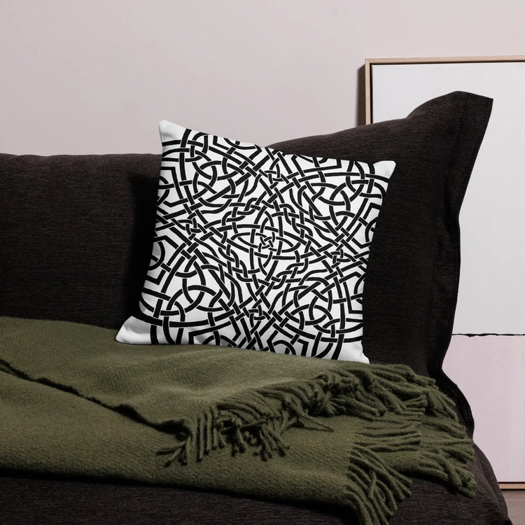 The back side of an 18 inch by 18 inch Xigfireon pillowcase featuring the inverted Black & White Súmáilte iteration of the Reach Of The Spirit Celtic knot design. The Reach Of The Spirit Celtic knot symbolizes Mother Earth.