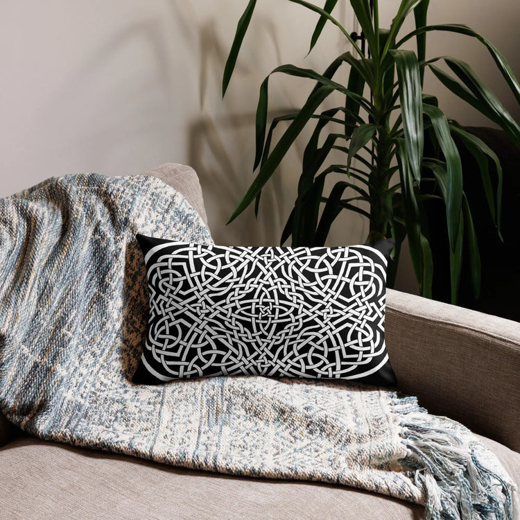 The front side of a 20 inch by 12 inch Xigfireon pillowcase featuring the Black & White Súmáilte iteration of the Reach Of The Spirit Celtic knot design. The Reach Of The Spirit Celtic knot represents Mother Earth.