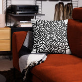 The back side of a 22 inch by 22 inch Xigfireon pillowcase featuring the inverted Black & White Súmáilte iteration of the Reach Of The Spirit Celtic knot design. The Reach Of The Spirit Celtic knot represents Mother Earth.