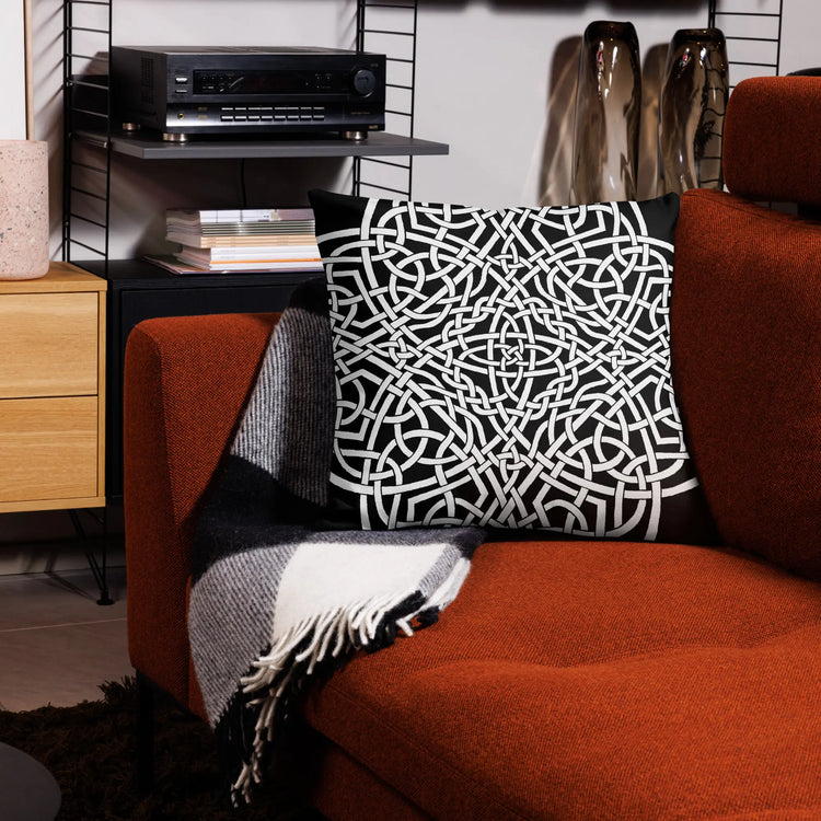 The front side of a 22 inch by 22 inch Xigfireon pillowcase featuring the Black & White Súmáilte iteration of the Reach Of The Spirit Celtic knot design. The Reach Of The Spirit Celtic knot represents Mother Earth.