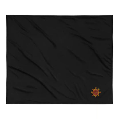 A black Xigfireon sherpa blanket embroidered with the Fire Colour iteration of the Morning Star Fire Celtic knot design.