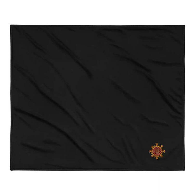 A black Xigfireon sherpa blanket embroidered with the Fire Colour iteration of the Morning Star Fire Celtic knot design.