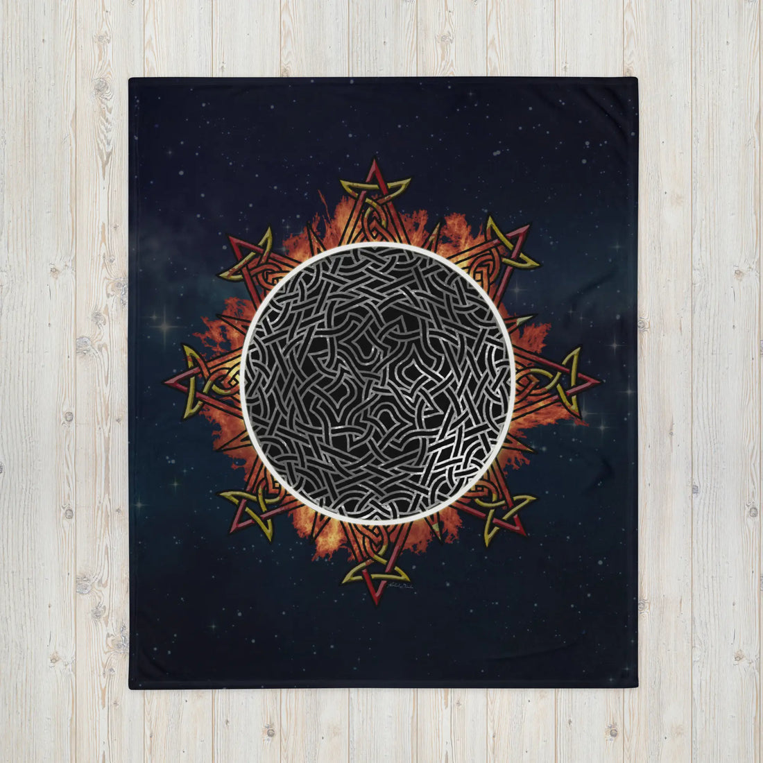 A 50 inch by 60 inch Xigfireon throw blanket featuring the Eclipsed iteration of the Morning Star Fire Celtic knot design. Inspired by the 2023 Annular Solar Eclipse.