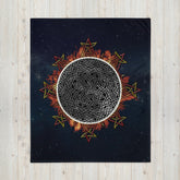 A 50 inch by 60 inch Xigfireon throw blanket featuring the Eclipsed iteration of the Morning Star Fire Celtic knot design. Inspired by the 2023 Annular Solar Eclipse.