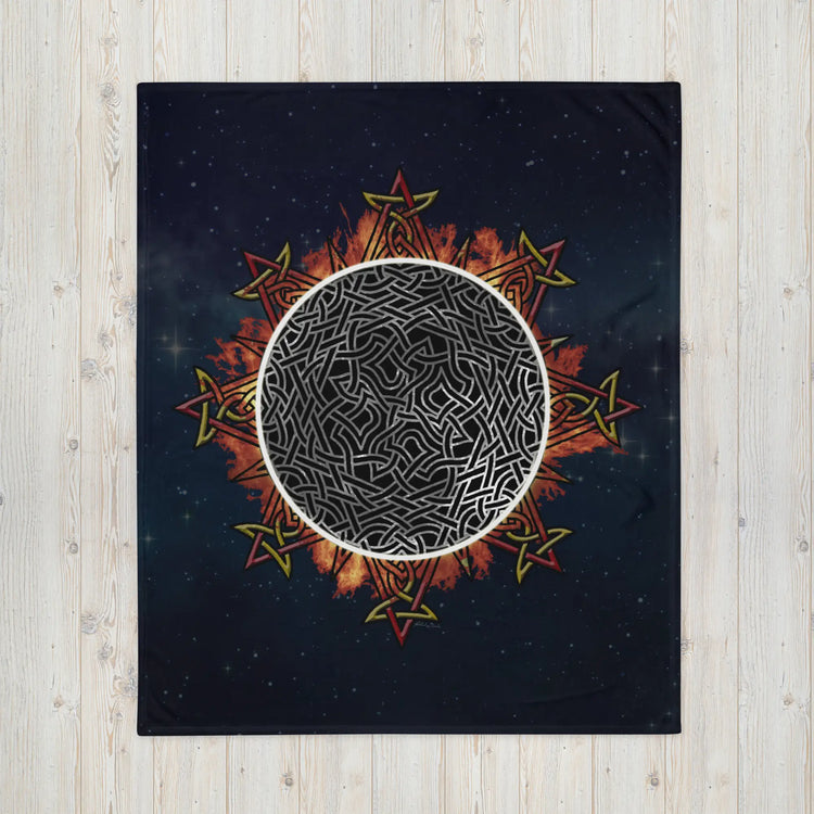 A 50 inch by 60 inch Xigfireon throw blanket featuring the Eclipsed iteration of the Morning Star Fire Celtic knot design. Inspired by the 2023 Annular Solar Eclipse.