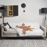 A 60 inch by 80 inch Xigfireon throw blanket featuring the Fire Colour iteration of the Morning Star Fire Celtic knot design. The Morning Star Fire Celtic knot represents the Sun.