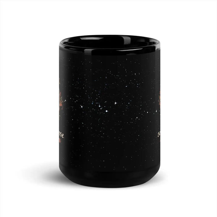 15oz black ceramic mug showing a starry space design with white stars and small orange celestial illustrations seen on the left and right sides, shown on a clean white background.