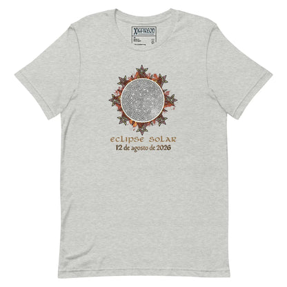A light heather gray t-shirt by Xigfireon featuring a circular Celtic knot eclipse graphic with the Spanish text &