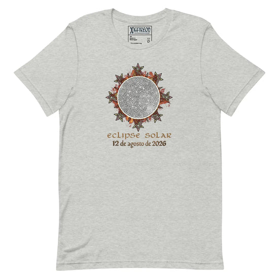 A light heather gray t-shirt by Xigfireon featuring a circular Celtic knot eclipse graphic with the Spanish text &