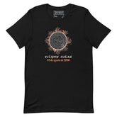 A black short-sleeve t-shirt with a graphic of a solar eclipse by Xigfireon. The graphic features a detailed Sun design with red and orange leaf-like accents, followed by the Spanish text &