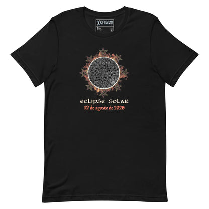 A black short-sleeve t-shirt with a graphic of a solar eclipse by Xigfireon. The graphic features a detailed Sun design with red and orange leaf-like accents, followed by the Spanish text &