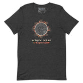 A dark heather gray t-shirt by Xigfireon featuring a graphic of a solar eclipse with orange and red leaf accents, and  Spanish text reading &