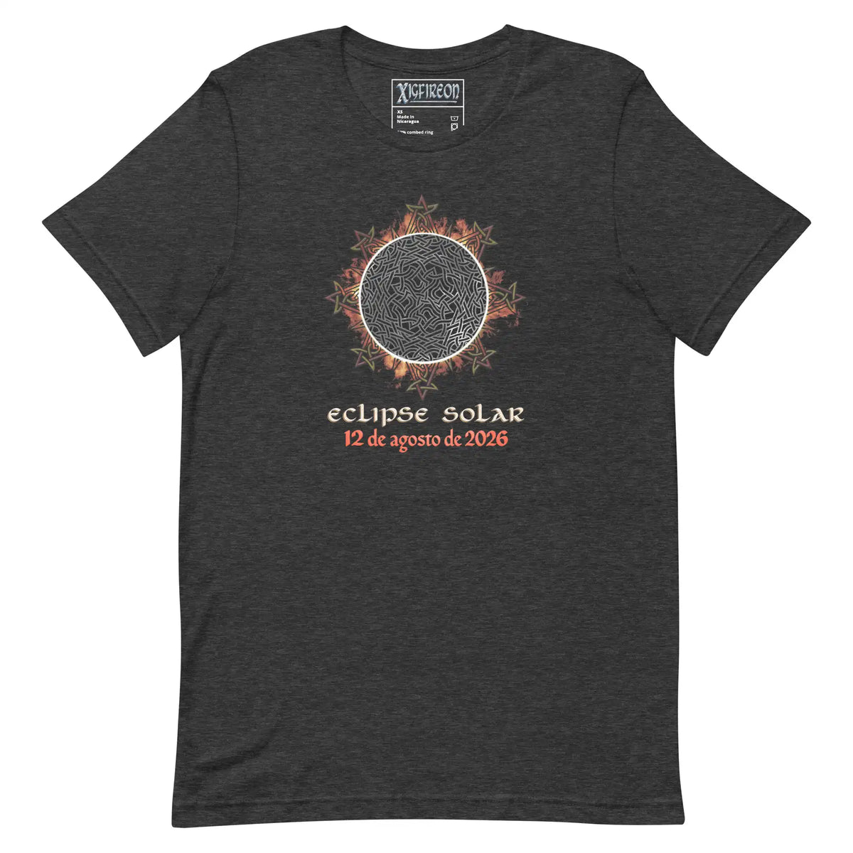 A dark heather gray t-shirt by Xigfireon featuring a graphic of a solar eclipse with orange and red leaf accents, and  Spanish text reading &