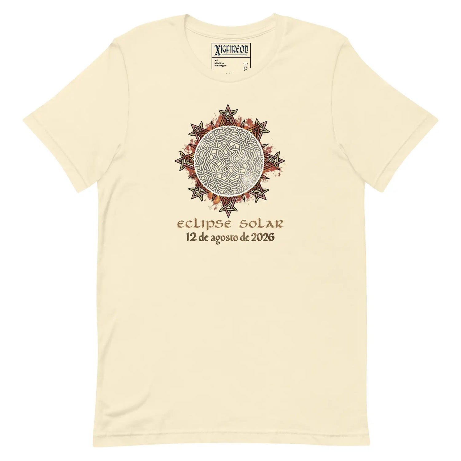 A natural cream-colored short-sleeve t-shirt by Xigfireon featuring a Celtic knot graphic of a solar eclipse with the Spanish text &