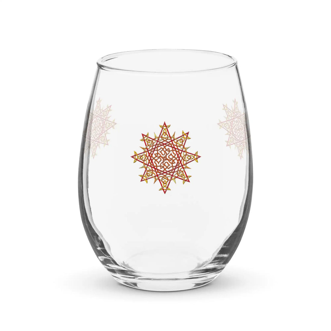 The front side of a stemless wine glass featuring the Fire Colour iteration of the Morning Star Fire Celtic knot design.